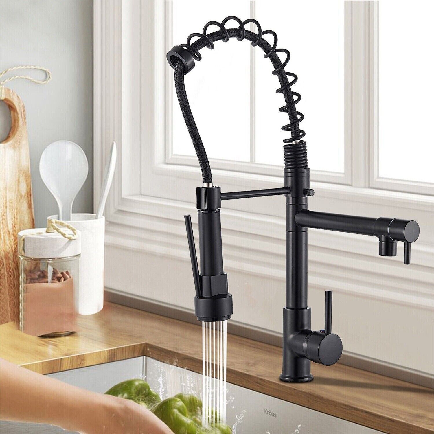 A vintage-inspired brass kitchen tap with cross handles, adding a classic touch to any kitchen decor.