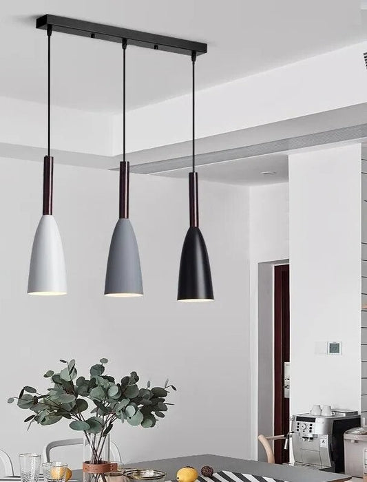 Contemporary pendant light trio for enhanced room lighting.