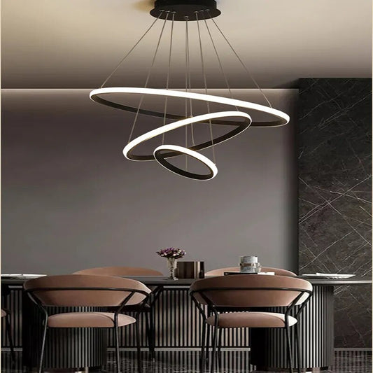Elegant 3-ring pendant chandelier lamp illuminating a modern living room with customizable lighting options