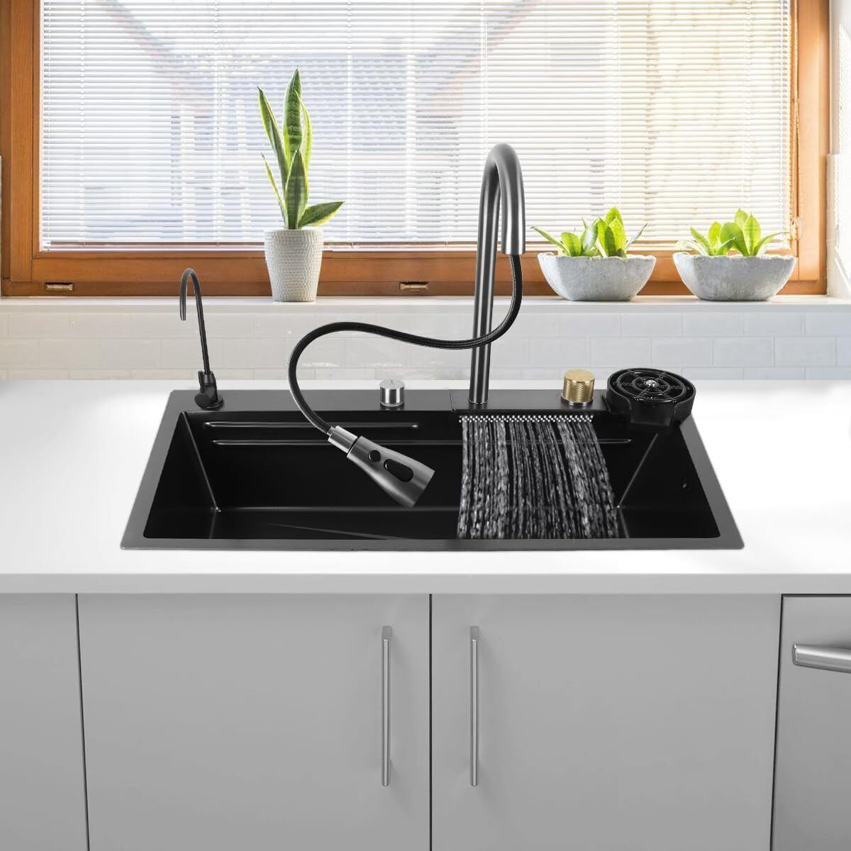 High-tech kitchen sink with waterfall effect and digital display