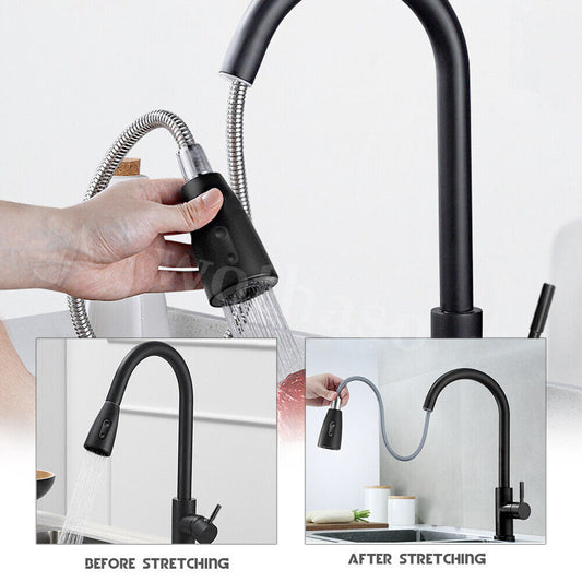 A stainless steel kitchen mixer tap with a pull-out sprayer nozzle.
