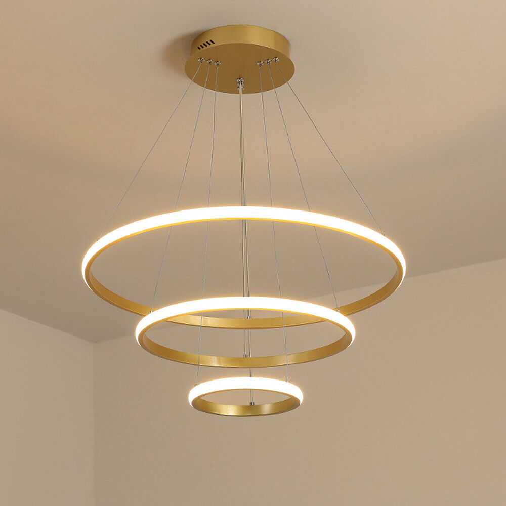A stylish 3-ring pendant chandelier lamp hanging from the ceiling.